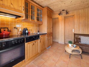 Cabinetry, Kitchen, Wood, Interior Design, Furniture, Flooring, Countertop, Floor, Cupboard, Kitchen Appliance