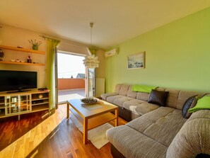 Room, Furniture, Property, Living Room, Interior Design, Building, Yellow, Floor, House, Table
