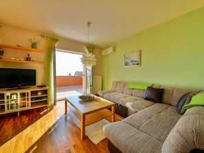Room, Furniture, Property, Living Room, Interior Design, Building, Yellow, Floor, House, Table