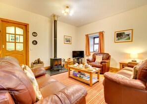 Inviting sitting area with freeview TV, DVD and wood burner