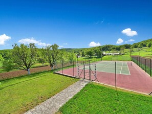 Green, Property, Daytime, Real Estate, Sport Venue, Sky, Natural Landscape, Land Lot, Grass, Home