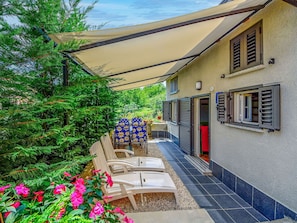 Awning, Shade, Balcony, Chair, Houseplant, Design, Patio, Outdoor Furniture, Flowerpot, Courtyard