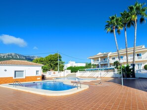 Sky, Water, Building, Plant, Azure, Tree, Body Of Water, Shade, Swimming Pool, Leisure