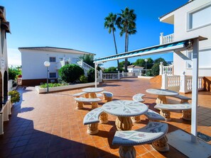 Sky, Building, Plant, Shade, Outdoor Furniture, Urban Design, Table, Tree, Leisure, Real Estate