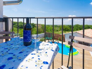 Sky, Cloud, Water, Table, Tableware, Azure, Building, Chair, Shade, Leisure