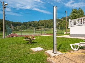 Sky, Cloud, Plant, Shade, Street Light, Land Lot, Tree, Outdoor Furniture, Urban Design, Leisure