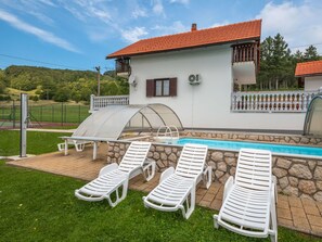 Sky, Cloud, Property, Plant, Shade, Outdoor Furniture, Chair, Tree, Land Lot, Building