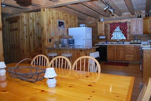 This oversized custom wood table easily seats 8.