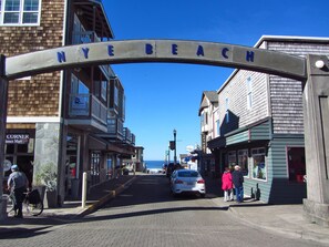 With the condo on the left of the arch, you are a minute walk to the beach!