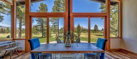 The dining table, which seats 8, has a backdrop that can't be beat