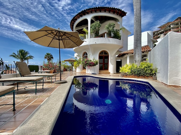 Our jewel-box style villa is located steps from the Conchas Chinas Beach!