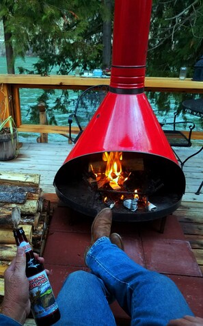 Enjoying the fire on the deck