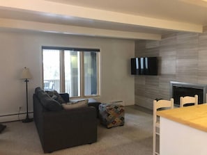 Living area. LED SmartTV. Comfortable queen sleeper sofa.