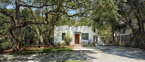 Beautifully and respectfully renovated vintage home with oak trees and fantastic landscaping.