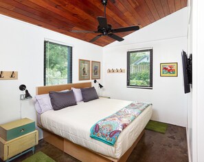 This bedroom has a King size bed and flat screen TV.