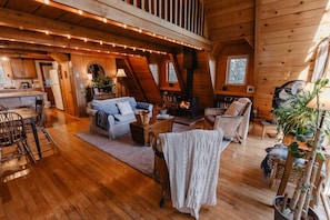 Living room (wood burning stove, tv, books, and wifi--but don't expect speedy speeds)