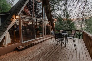 Enjoy drinks and quiet evenings here on the front porch.