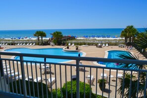 Large wrap around balcony overlooking 2 pools and Beach