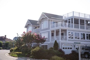 Enjoy bay views from the screened porch or rooftop deck!