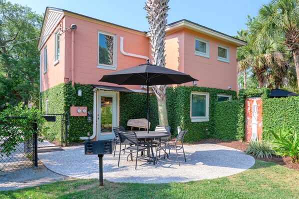 Enjoy the completely fenced in backyard with a patio and charcoal grill.