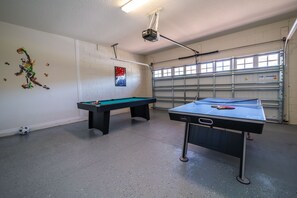 Games room showing pool table and ping pong