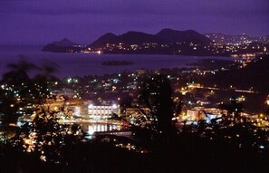 Night view over Castries and out to Pigeon Island in the distance
