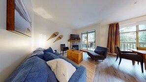 Living area with fireplace and TV
