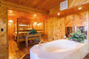 Very romantic with the floating Jacuzzi tub between the king bed and the ensuite