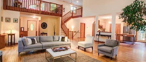 The Great Room w/ view of kitchen and upper lofts.