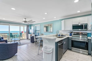 The kitchen is clean and well equipped with full size appliances.