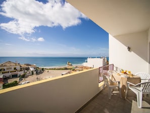 Cloud, Sky, Building, Water, Table, House, Seaside Resort, Chair, Beach, Wood