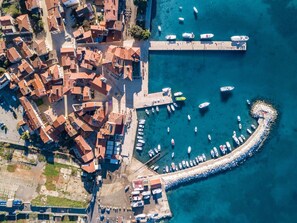 Water, Water Resources, Boat, Azure, Blue, World, Body Of Water, Watercraft, Coastal And Oceanic Landforms, Urban Design