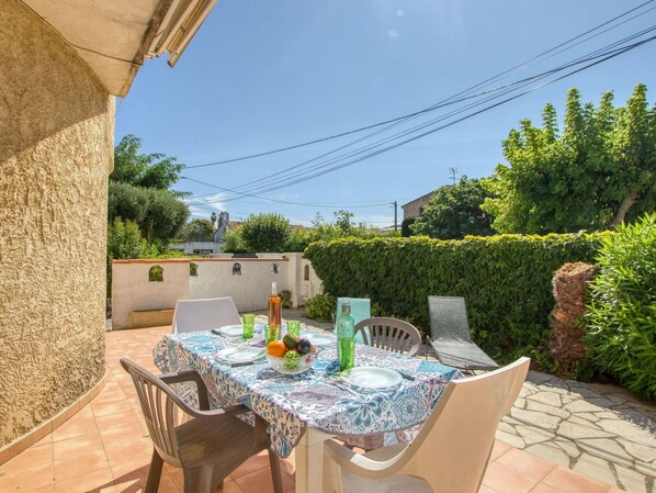 Plant, Sky, Furniture, Property, Table, Chair, Tableware, Outdoor Furniture, Flowerpot, Outdoor Table