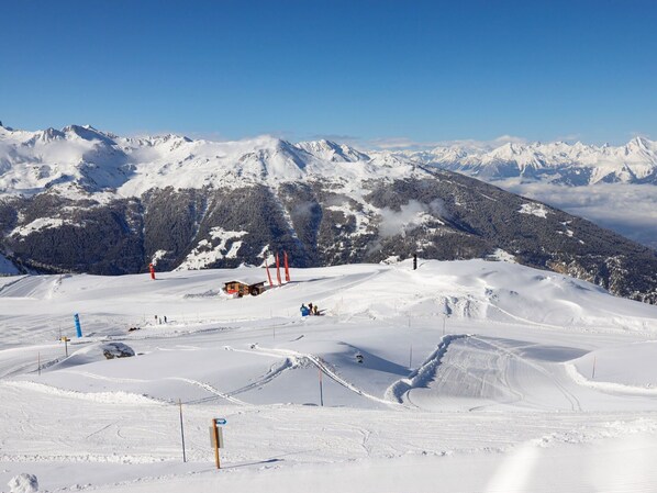 Sky, Mountain, Snow, Slope, Outdoor Recreation, Winter Sport, Terrain, Freezing, Recreation, Sports