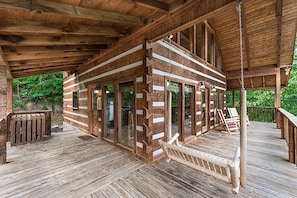 Enjoy magnificent mountain views from the wrap-around deck, rockers, porch swing