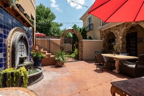 COURTYARD WITH FOUNTAIN AND SITTING AREA'S