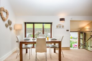 Dining Area on the first floor overlooking the Slate Water Feature