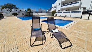 Relaxing area by the pools