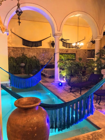 Looking across the beautiful hammocks to the daybed in the sitting area