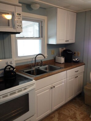 Kitchen with tiled flooring 