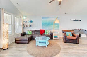 Main living area with open floor plan and ocean view.