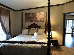 Queen bed with high end bedding and adjustable frame , smart TV