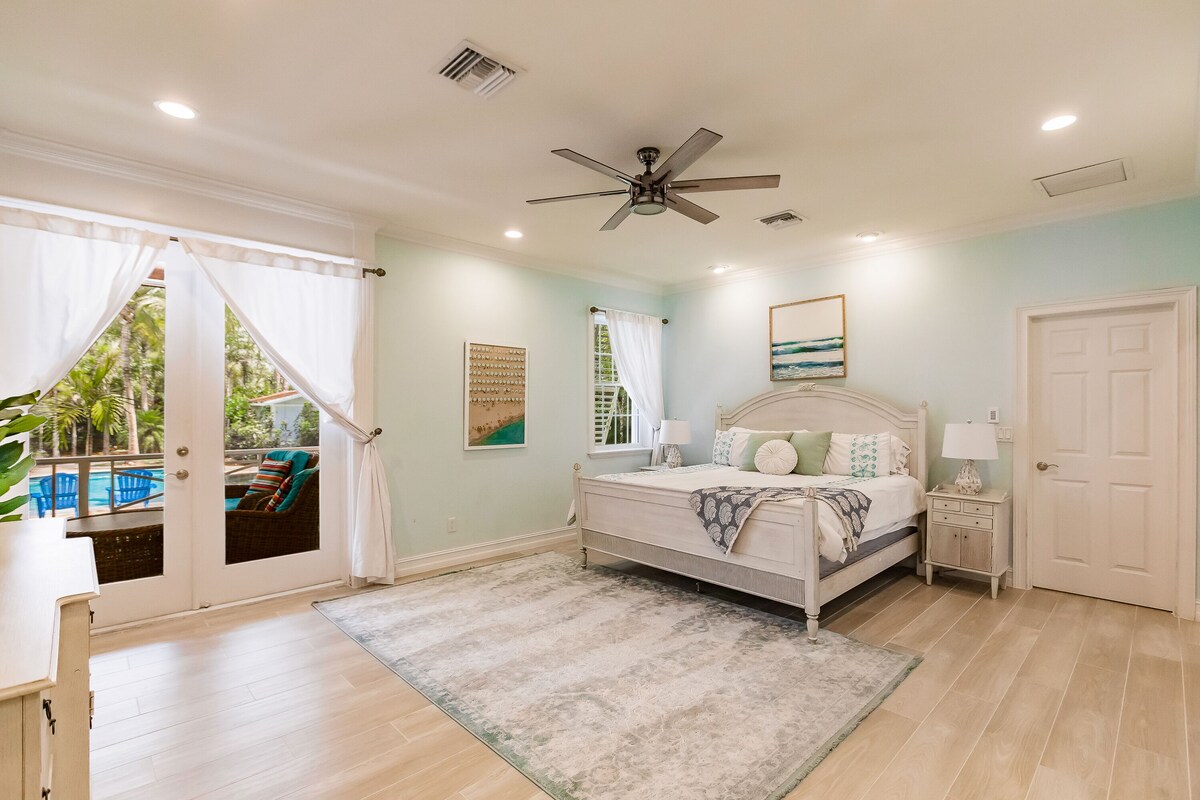 Key West Style Luxury Home with resort style heated pool and infinity line spa