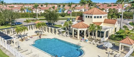 One of Emerald Lakes' two pools & the clubhouse