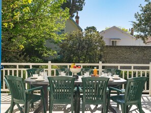 Table, Sky, Property, Furniture, Building, Chair, Tree, Outdoor Table, Yellow, Leisure