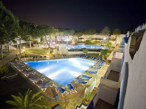 Swimming Pool, Property, Resort, Building, Hotel, Apartment, Leisure, Night, Real Estate, Tree