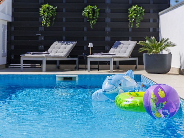 Blue, Swimming Pool, Outdoor Furniture, Furniture, Composite Material, Flowerpot, Leisure, Resort, Houseplant, Hotel