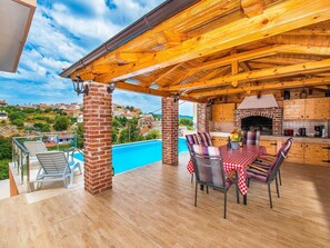 Property, Furniture, Cloud, Sky, Building, Wood, Lighting, Outdoor Furniture, Plant, Shade