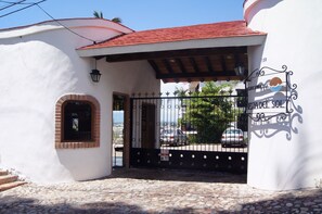 The gated entrance to the condo complex.  Security 24/7.