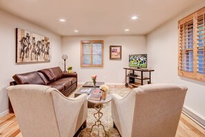 Living Room - comfortable seating and large flatscreen. Great for relaxing after a day on the mountain!